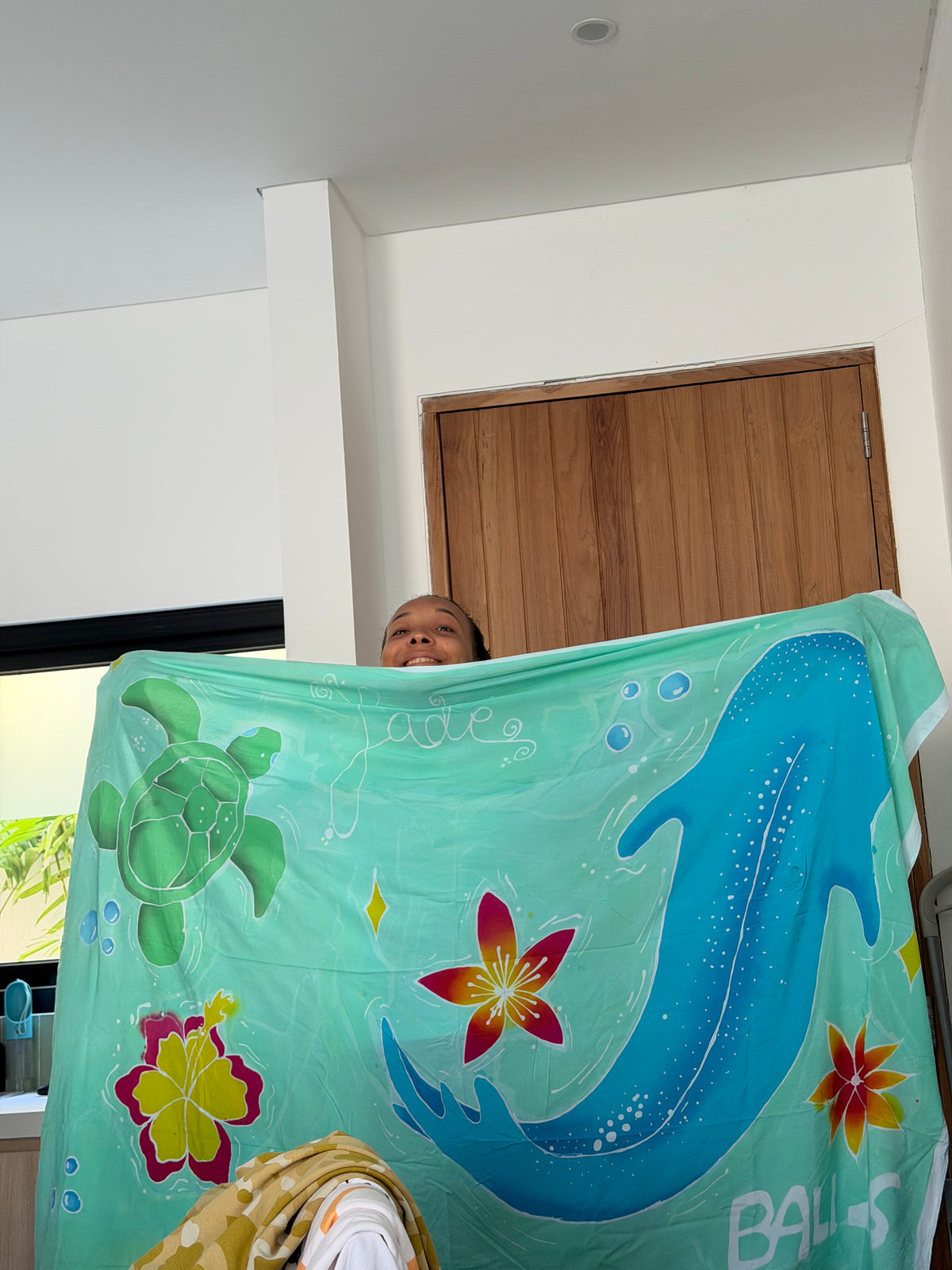 Jade wearing a finished custom batik piece from Soleia Art Club Bali